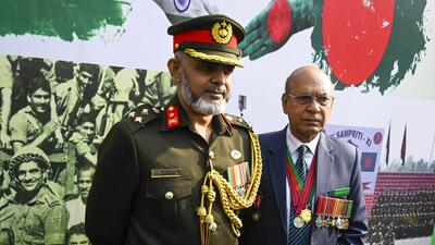 Brigadier General Md. Aminur Rahman (left) and Quazi Sajjad Ali Zahir of Bangladesh Army during the wreath-laying ceremony to mark the 53rd Vijay Diwas at Fort William in Kolkata on Monday. (Samir Jana/ HT Photo)