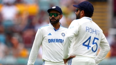 India's Virat Kohli (L) and Rohit Sharma look on during the first day of the third cricket Test match between Australia and India The Gabba in Brisbane (AFP) India's Virat Kohli (L) and Rohit Sharma look on during the first day of the third cricket Test match between Australia and India The Gabba in Brisbane (AFP)