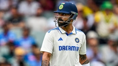 India's Virat Kohli walks back to the pavilion. (Photo by Michael ERREY / AFP) (AFP) India's Virat Kohli walks back to the pavilion. (Photo by Michael ERREY / AFP) (AFP)