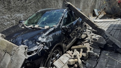 The wreckage of a car lies outside a home, in the aftermath of Cyclone Chido, within Labattoir, in Mayotte,. (REUTERS)