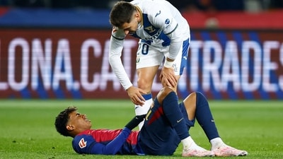 FC Barcelona's Lamine Yamal reacts after sustaining an injury as Leganes' Javi Hernandez looks on. (REUTERS)