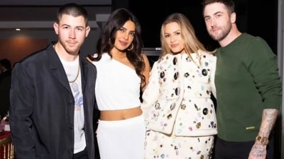 Priyanka Chopra and Nick Jonas attend a Christmas bash. Priyanka Chopra and Nick Jonas attend a Christmas bash.