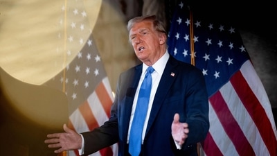 PALM BEACH, FLORIDA - DECEMBER 16: U.S. President-elect Donald Trump speaks at a news conference at Trump's Mar-a-Lago resort on December 16, 2024 in Palm Beach, Florida. In a news conference that went over an hour, Trump announced that SoftBank will invest over $100 billion in projects in the United States including 100,000 artificial intelligence related jobs and then took questions on Syria, Israel, Ukraine, the economy, cabinet picks, and many other topics. Andrew Harnik/Getty Images/AFP (Photo by Andrew Harnik / GETTY IMAGES NORTH AMERICA / Getty Images via AFP) (Getty Images via AFP) PALM BEACH, FLORIDA - DECEMBER 16: U.S. President-elect Donald Trump speaks at a news conference at Trump's Mar-a-Lago resort on December 16, 2024 in Palm Beach, Florida. In a news conference that went over an hour, Trump announced that SoftBank will invest over $100 billion in projects in the United States including 100,000 artificial intelligence related jobs and then took questions on Syria, Israel, Ukraine, the economy, cabinet picks, and many other topics. Andrew Harnik/Getty Images/AFP (Photo by Andrew Harnik / GETTY IMAGES NORTH AMERICA / Getty Images via AFP) (Getty Images via AFP)