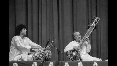 Tabla maestro Ustad Zakir Hussain performs with sitar maestro Pandit Ravi Shankar in New Delhi in February 1995. (PTI) Tabla maestro Ustad Zakir Hussain performs with sitar maestro Pandit Ravi Shankar in New Delhi in February 1995. (PTI)