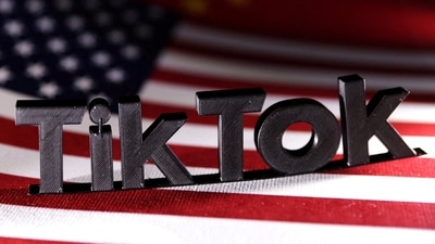 FILE PHOTO: TikTok logo is placed on the U.S. and Chinese flags in this illustration taken, April 25, 2024. REUTERS/Dado Ruvic/Illustration/File Photo (REUTERS)
