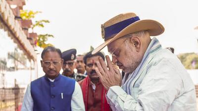 Union home minister Amit Shah pays tributes at the Amar Vatika memorial for soldiers who lost their lives in Naxalite violence, in Jagdalpur, Bastar, Monday. (PTI) Union home minister Amit Shah pays tributes at the Amar Vatika memorial for soldiers who lost their lives in Naxalite violence, in Jagdalpur, Bastar, Monday. (PTI)