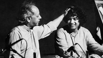Tabla maestro Zakir Hussain on stage with his legendary father Allah Rakha in an old photo. Tabla maestro Zakir Hussain on stage with his legendary father Allah Rakha in an old photo.