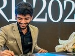 World chess champion Gukesh Dommaraju signs an autograph during a meet and greet session in Singapore after becoming world chess champion. World chess champion Gukesh Dommaraju signs an autograph during a meet and greet session in Singapore after becoming world chess champion.