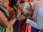 PM Narendra Modi with environmentalist Tulsi Gowda (File) PM Narendra Modi with environmentalist Tulsi Gowda (File)