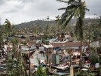 This handout photograph taken and released by the French Securite Civile shows destroyed housing in Combani, on the French Indian Ocean territory of Mayotte, after the cyclone Chido hit the archipelago. This handout photograph taken and released by the French Securite Civile shows destroyed housing in Combani, on the French Indian Ocean territory of Mayotte, after the cyclone Chido hit the archipelago.