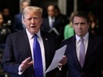 FILE PHOTO: Former U.S. President Donald Trump, alongside his attorney Todd Blanche, speaks to the media as he arrives for his criminal trial for allegedly covering up hush money payments at Manhattan Criminal Court