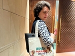 Congress MP carrying a tote bag with message over Bangladesh in it 
