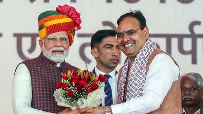 Prime Minister Narendra Modi being felicitated by Rajasthan Chief Minister Bhajan Lal Sharma during the ‘Ek Varsh-Parinaam Utkarsh’: Completion of 1 year of State Government of Rajasthan’ programme, in Jaipur on Tuesday. (ANI)