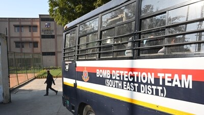 Security personnel from Bomb Squad leaves after scan the premises at Cambridge School in Shivnivaspuri after an alleged Bomb threat mail was received , in New Delhi, India, on Friday, December 13, 2024. (Hindustan Times)