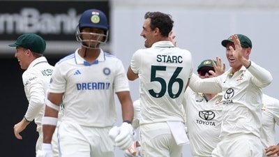 Australia's bowler Mitchell Starc (C) celebrates the wicket of India's Yashasvi Jaiswal with teammates. Jaiswal played a rash shot to throw his wicket away in the first over itself. (AFP) Australia's bowler Mitchell Starc (C) celebrates the wicket of India's Yashasvi Jaiswal with teammates. Jaiswal played a rash shot to throw his wicket away in the first over itself. (AFP)