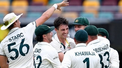 Australia's Pat Cummins celebrates after taking a wicket with teammates  Jono Searle/AAP Image via REUTERS (AAP Image via REUTERS)