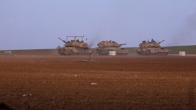 Israeli armored vehicles manoeuvre near Gaza border, amid the ongoing conflict in Gaza between Israel and Hamas, in Israel, December 16, 2024. (REUTERS/Amir Cohen)
