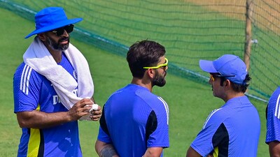 Abhishek Nayar (L), Virat Kohli (C) and Gautam Gambhir having a chat (Hindustan Times)