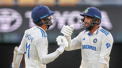India's Akash Deep, left, fist bumps with batting partner Jasprit Bumrah during play on day four of the third cricket test between India and Australia at the Gabba in Brisbane. (AP) India's Akash Deep, left, fist bumps with batting partner Jasprit Bumrah during play on day four of the third cricket test between India and Australia at the Gabba in Brisbane. (AP)