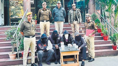 The four accused in police custody. (HT Photo) The four accused in police custody. (HT Photo)