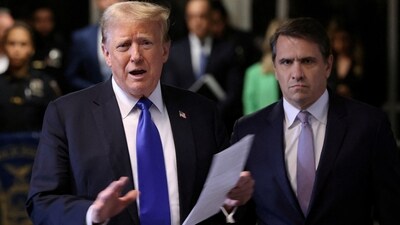 FILE PHOTO: Former U.S. President Donald Trump, alongside his attorney Todd Blanche, speaks to the media as he arrives for his criminal trial for allegedly covering up hush money payments at Manhattan Criminal Court (REUTERS)