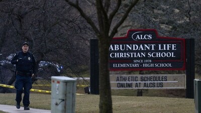 A second-grade student called 911 about the active shooting at Abundant Life Christian School, leading to immediate police action.
Scott Olson/Getty Images/AFP (Photo by SCOTT OLSON / GETTY IMAGES NORTH AMERICA / Getty Images via AFP) (Getty Images via AFP) A second-grade student called 911 about the active shooting at Abundant Life Christian School, leading to immediate police action.
Scott Olson/Getty Images/AFP (Photo by SCOTT OLSON / GETTY IMAGES NORTH AMERICA / Getty Images via AFP) (Getty Images via AFP)