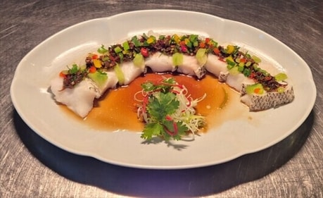 Hakkasan has a steamed Chilean seabass with preserved mustard green Hakkasan has a steamed Chilean seabass with preserved mustard green