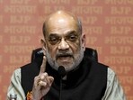 Union home minister Amit Shah addresses a press conference at BJP HQ in New Delhi.
Union home minister Amit Shah addresses a press conference at BJP HQ in New Delhi.