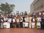 Leader of Opposition in the Lok Sabha Rahul Gandhi, Leader of Opposition in the Rajya Sabha Mallikarjun Kharge, Congress MPs Priyanka Gandhi Vadra, Kumari Selja and KC Venugopal and other opposition MPs hold portraits of Dr. BR Ambedkar during a protest amid the Winter session of Parliament. 