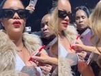 Rihanna made Mariah Carey sign her chest at the latter's Christmas concert. Rihanna made Mariah Carey sign her chest at the latter's Christmas concert.