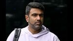 TOPSHOT - This picture taken on December 1, 2024 shows India's spin bowler Ravichandran Ashwin arriving to attend a cricket warm-up session at Manuka Oval in Canberra. (Photo by Saeed KHAN / AFP) (AFP)