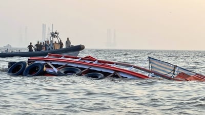 A boat carrying 85 passengers capsizes near the Gateway of India, in Mumbai on Wednesday. (Indian Coast Guard)