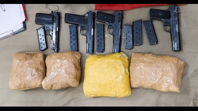 Army & J&K Police in a joint search operation in general area Amrohi, Tangdhar, Kupwara recover four pistols, six pistol magazines, approx four kgs of narcotics and other war-like stores on Wednesday. (ANI) Army & J&K Police in a joint search operation in general area Amrohi, Tangdhar, Kupwara recover four pistols, six pistol magazines, approx four kgs of narcotics and other war-like stores on Wednesday. (ANI)