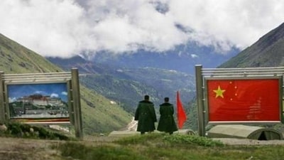 Chinese army officers along the LAC near Sikkim. (AP File Photo) Chinese army officers along the LAC near Sikkim. (AP File Photo)