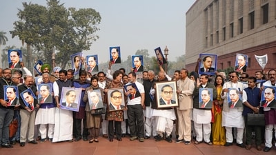 Leader of Opposition in the Lok Sabha Rahul Gandhi, Leader of Opposition in the Rajya Sabha Mallikarjun Kharge, Congress MPs Priyanka Gandhi Vadra, Kumari Selja and KC Venugopal and other opposition MPs hold portraits of Dr. BR Ambedkar during a protest amid the Winter session of Parliament. (PTI ) Leader of Opposition in the Lok Sabha Rahul Gandhi, Leader of Opposition in the Rajya Sabha Mallikarjun Kharge, Congress MPs Priyanka Gandhi Vadra, Kumari Selja and KC Venugopal and other opposition MPs hold portraits of Dr. BR Ambedkar during a protest amid the Winter session of Parliament. (PTI )