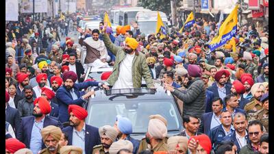 Punjab chief minister Bhagwant Mann at a roadshow in Amritsar on Wednesday. (ANI Photo) Punjab chief minister Bhagwant Mann at a roadshow in Amritsar on Wednesday. (ANI Photo)