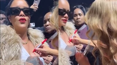 Rihanna made Mariah Carey sign her chest at the latter's Christmas concert. Rihanna made Mariah Carey sign her chest at the latter's Christmas concert.