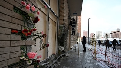 Flowers are attached to the facade of an apartment block in Moscow, Russia, on Wednesday, Dec. 18, 2024, where a bomb killed Lt. Gen. Igor Kirillov, the head of Russia's Radiation, Biological, and Chemical Defense Forces, and his assistant, Ilya Polikarpov. (AP)