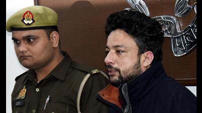 The suspect in Ghaziabad police custody on Wednesday. (Sakib Ali/HT Photo) The suspect in Ghaziabad police custody on Wednesday. (Sakib Ali/HT Photo)