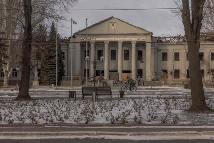 A man rides a bicycle past a university building destroyed by shelling in the city of Pokrovsk, eastern Donetsk region, on December 14, 2024, amid the Russian invasion of Ukraine. (AFP) A man rides a bicycle past a university building destroyed by shelling in the city of Pokrovsk, eastern Donetsk region, on December 14, 2024, amid the Russian invasion of Ukraine. (AFP)