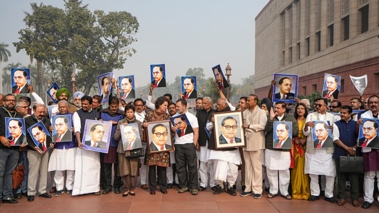 Leader of Opposition in the Lok Sabha Rahul Gandhi, Leader of Opposition in the Rajya Sabha Mallikarjun Kharge, Congress MPs Priyanka Gandhi Vadra, Kumari Selja and KC Venugopal and other opposition MPs hold portraits of Dr. BR Ambedkar during a protest amid the Winter session of Parliament. (PTI )