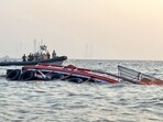 A boat carrying 85 passengers capsizes near the Gateway of India, in Mumbai on Wednesday. A boat carrying 85 passengers capsizes near the Gateway of India, in Mumbai on Wednesday.