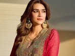 Kriti Sanon wore a rani pink embroidered Kalidar kurta set for one of the functions. 