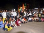BJP supporters during a protest over the arrest of Karnataka MLC CT Ravi over his alleged remarks on minister Laxmi Hebbalkar
