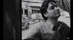 Soumitra Chatterjee on a tram in Apur Sansar (1959). (Film still)