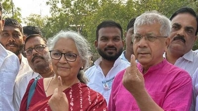 FILE: Vanchit Bahujan Aghadi (VBA) President Prakash Ambedkar and his wife Anjali Maydeo show their ink-marked fingers after casting their votes for Maharashtra Assembly Elections, in Akola. (ANI) FILE: Vanchit Bahujan Aghadi (VBA) President Prakash Ambedkar and his wife Anjali Maydeo show their ink-marked fingers after casting their votes for Maharashtra Assembly Elections, in Akola. (ANI)