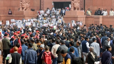 INDIA Alliance MPs and BJP MPs protest, each highlighting their respective issues, at the Makar Dwar of the Parliament in New Delhi. (ANI) INDIA Alliance MPs and BJP MPs protest, each highlighting their respective issues, at the Makar Dwar of the Parliament in New Delhi. (ANI)