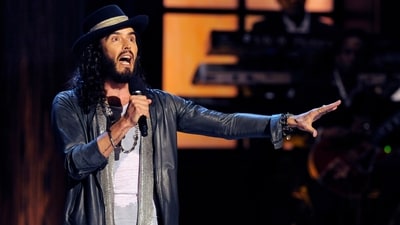 Comedian Russell Brand performs at Eddie Murphy: One Night Only, a celebration of Murphy's career, at the Saban Theater in Beverly Hills. (Photo by Chris Pizzello/Invision/AP, File) (Chris Pizzello/Invision/AP) Comedian Russell Brand performs at Eddie Murphy: One Night Only, a celebration of Murphy's career, at the Saban Theater in Beverly Hills. (Photo by Chris Pizzello/Invision/AP, File) (Chris Pizzello/Invision/AP)