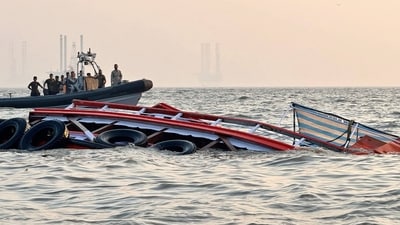 Indian defence personnel carrying out rescue operation after an accident off the coast of Mumbai. (AFP) Indian defence personnel carrying out rescue operation after an accident off the coast of Mumbai. (AFP)