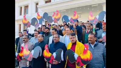 Leader of Opposition Jai Ram Thakur along with party legislators holding placards during a protest at Vidhan Sabha on Thursday. (HT Photo)